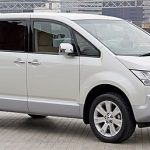 White Mitsubishi Delica in car park